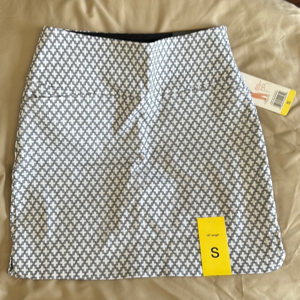 Brand is SC & Co.  Black and White skirt.  Very stretchy.  New with tags.